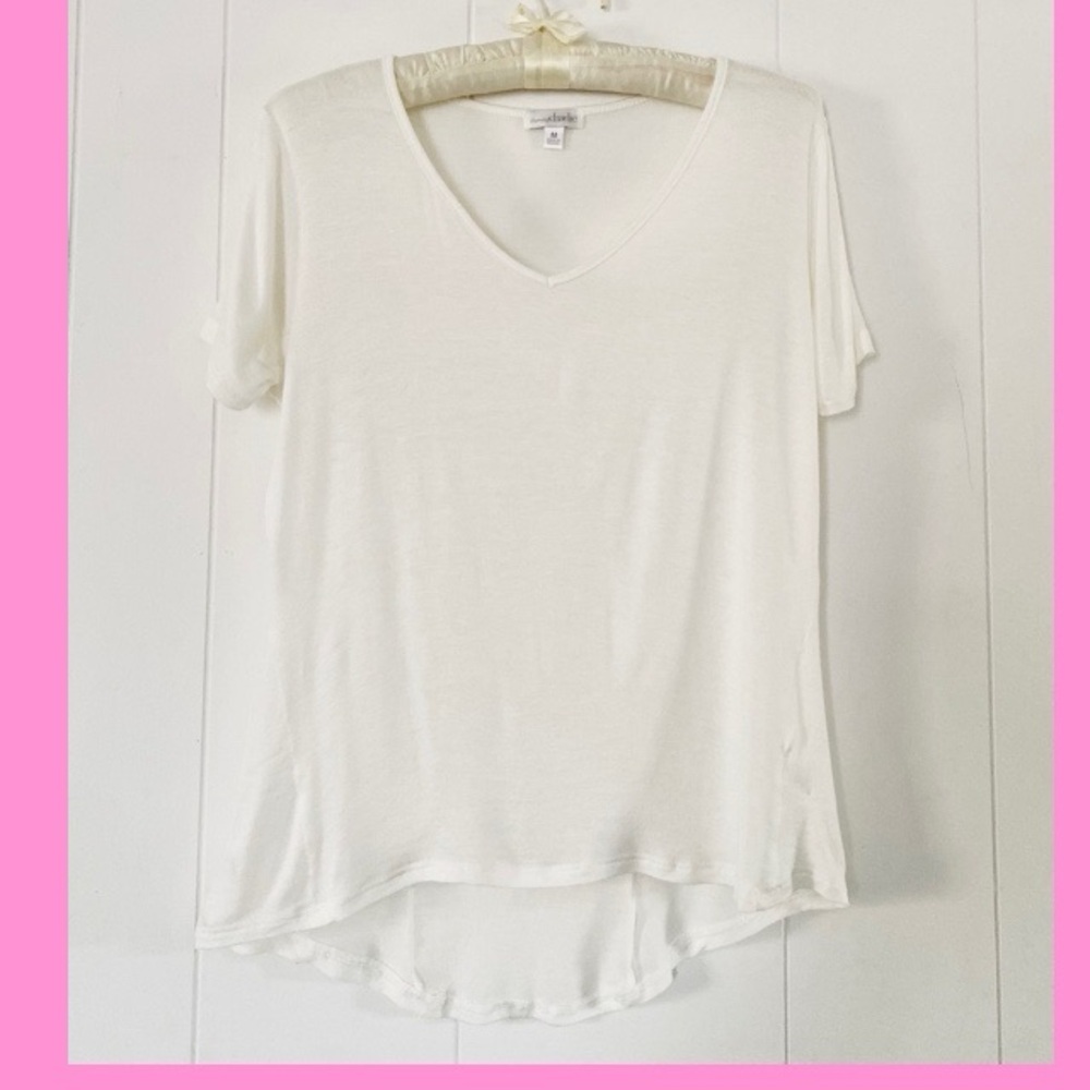 Charming Charlie ivory, short sleeve top. Size M